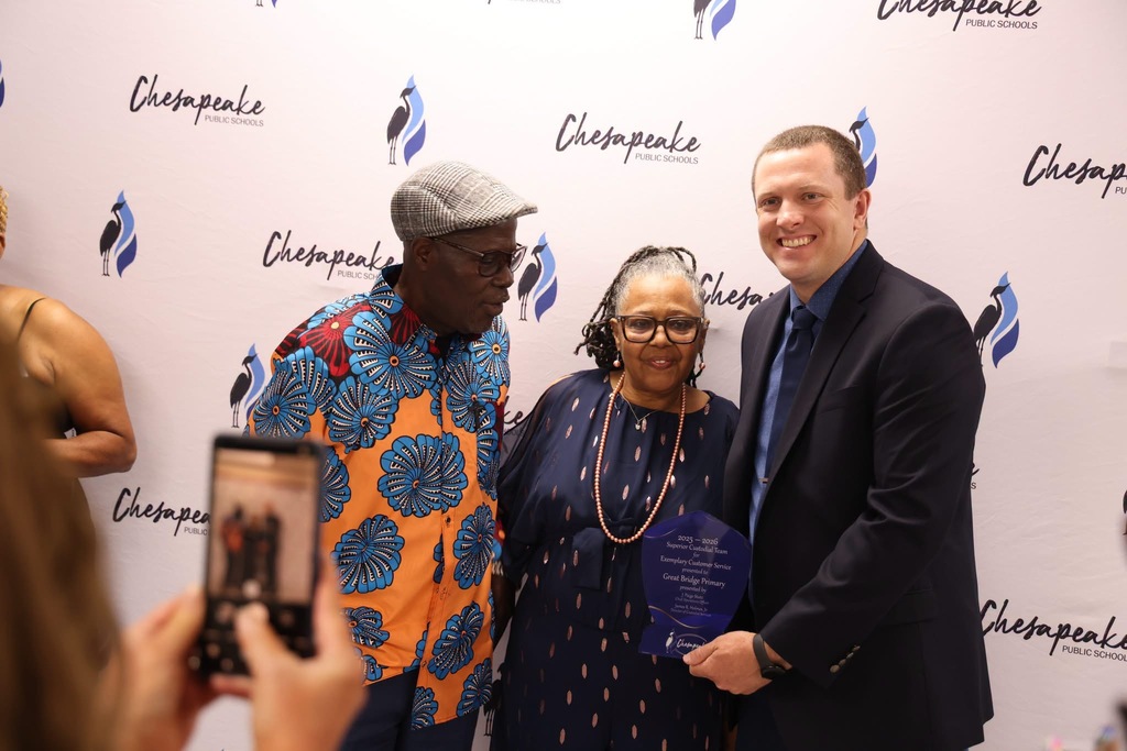 Our custodians posing with Mr. Mason proudly after receiving a superior award at the Custodian Banquet on Saturday, May 16th.