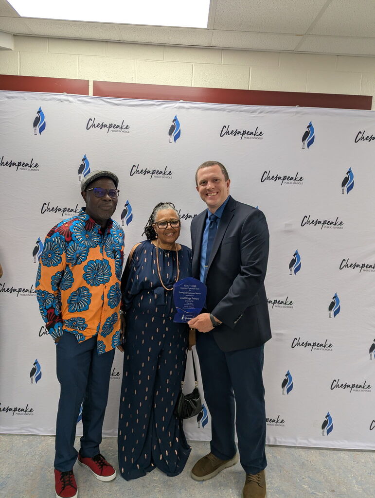 Our custodians posing with Mr. Mason proudly after receiving a superior award at the Custodian Banquet on Saturday, May 16th.