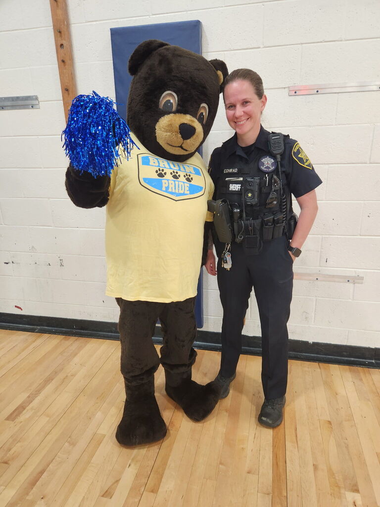 Officer Conrad and Bruin the Bear