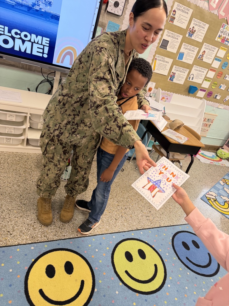 Classmates giving military mom cards