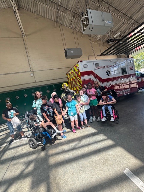 Students and their entire class at the fire station