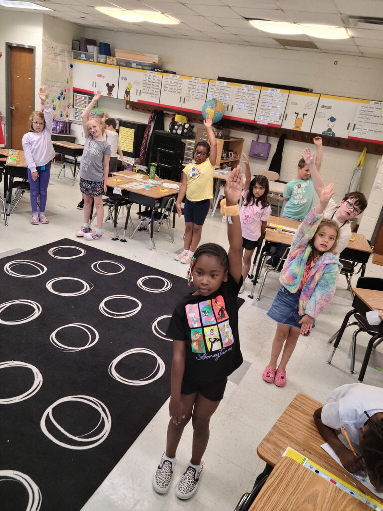 Ms. WIlliams 1st graders working on time