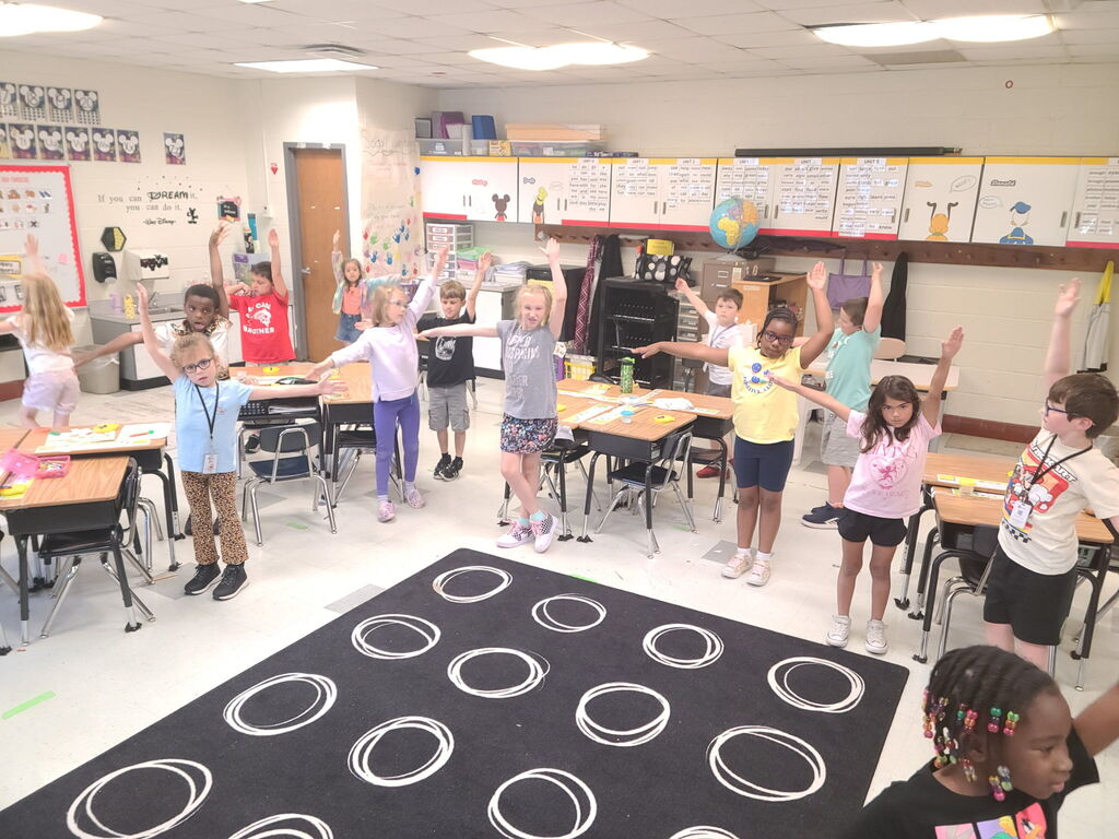 Ms. WIlliams 1st graders working on time