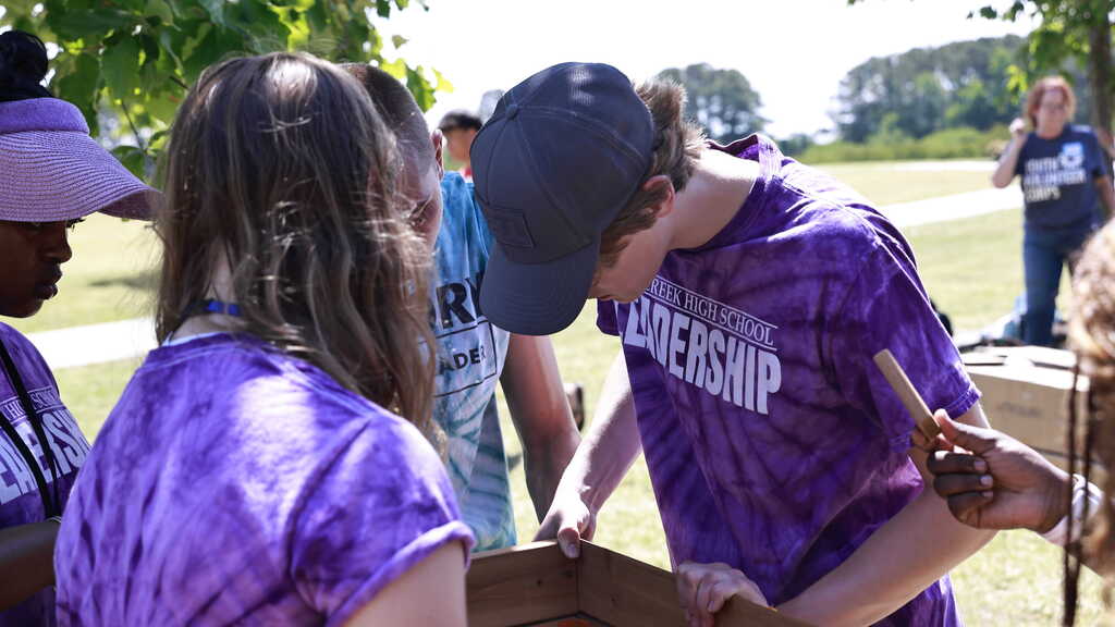 Two DCHS SCA members work on a service project at SCA Citywide