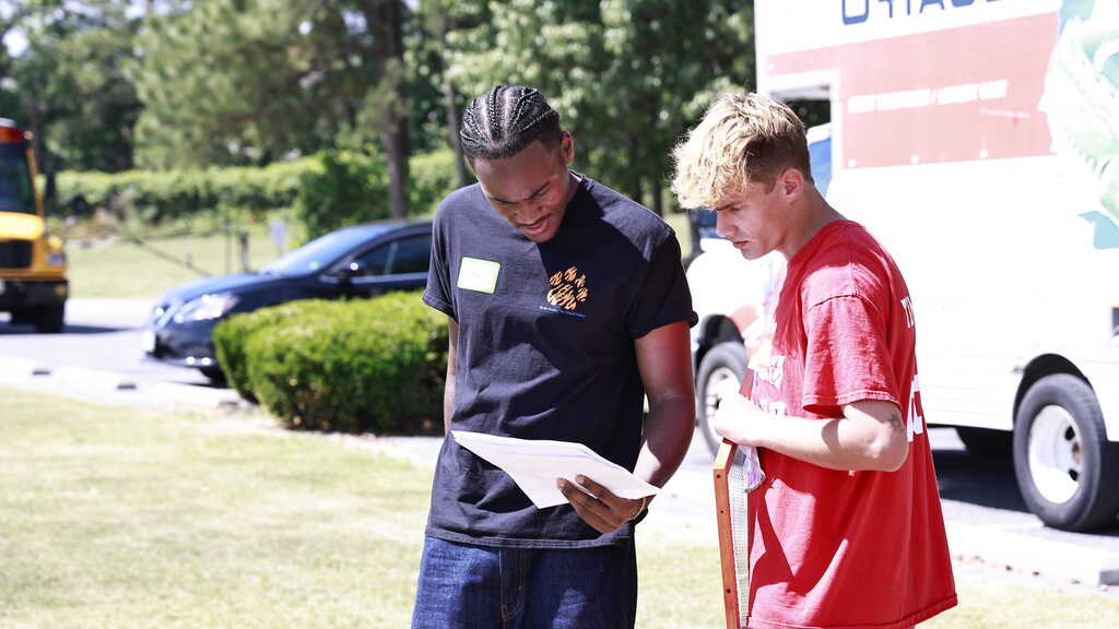 An OSH and GFH SCA Member work together on a project