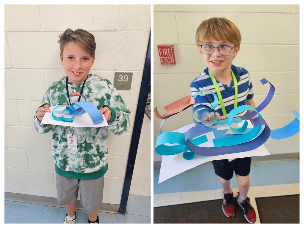 Students with wave sculptures