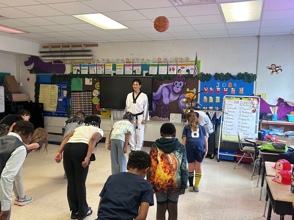 students and presenters at community helpers day
