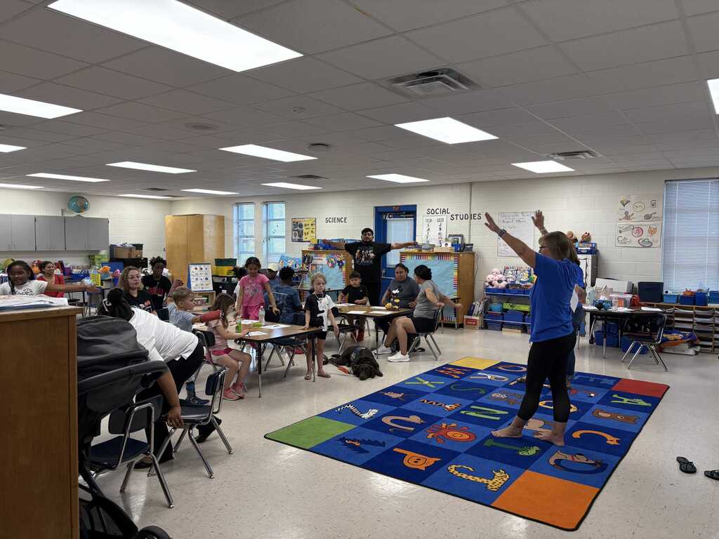 Ms. Fries leading a station