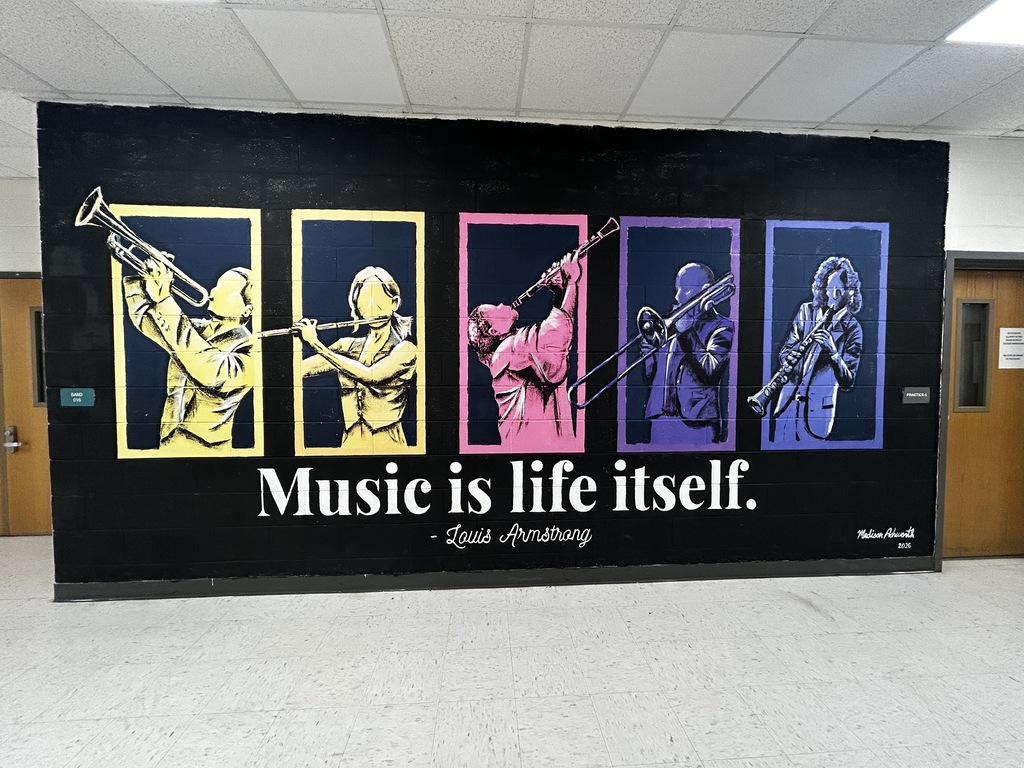 Mural created by a student about music featuring musicians and a Louis Armstrong quote