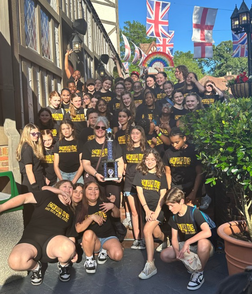 students posing for photo at Busch gardens for chorus concert 