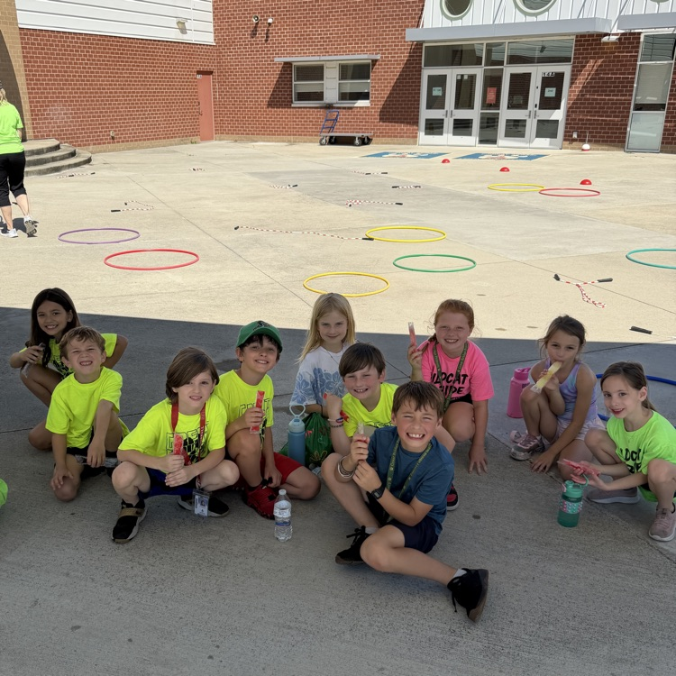 some of Ms. Addington’s 2nd graders enjoying ice pops on field day