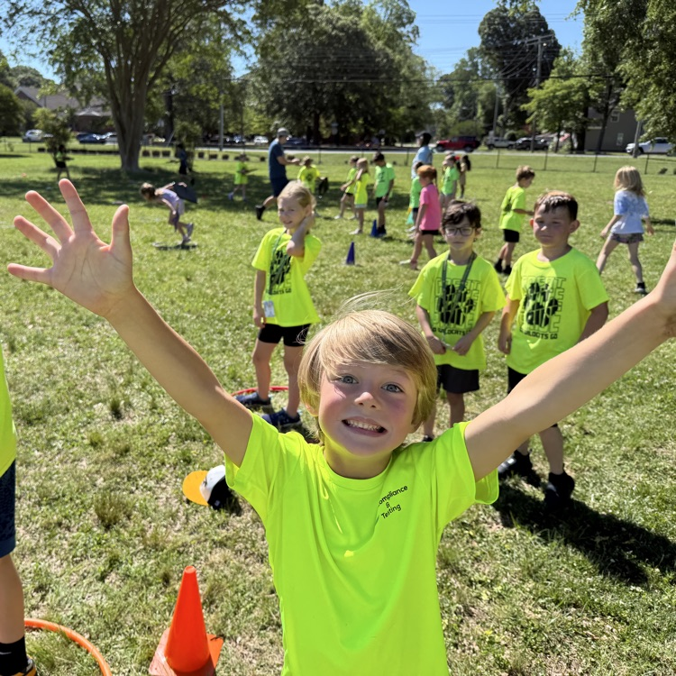 Ms. Moore’s student excitedly posing before starting the relay at field day