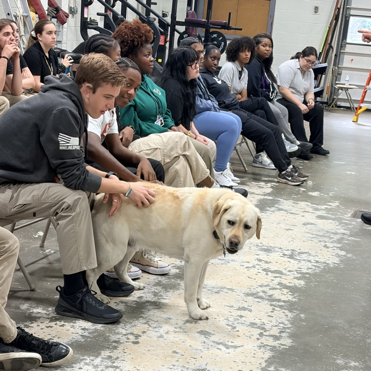 chino the fire dog and some students 