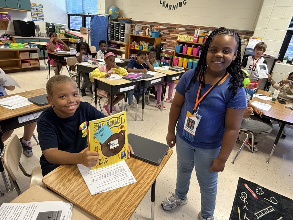 student delivering yearbooks