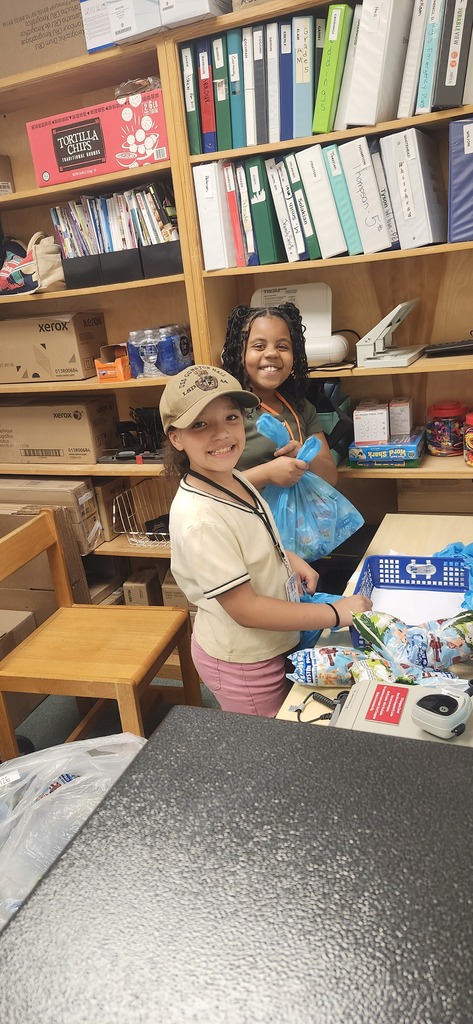 student delivering yearbooks