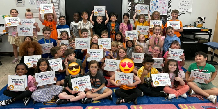 Mrs Teeman and Mrs Scott’s students showing off their published book filled with their how to writings