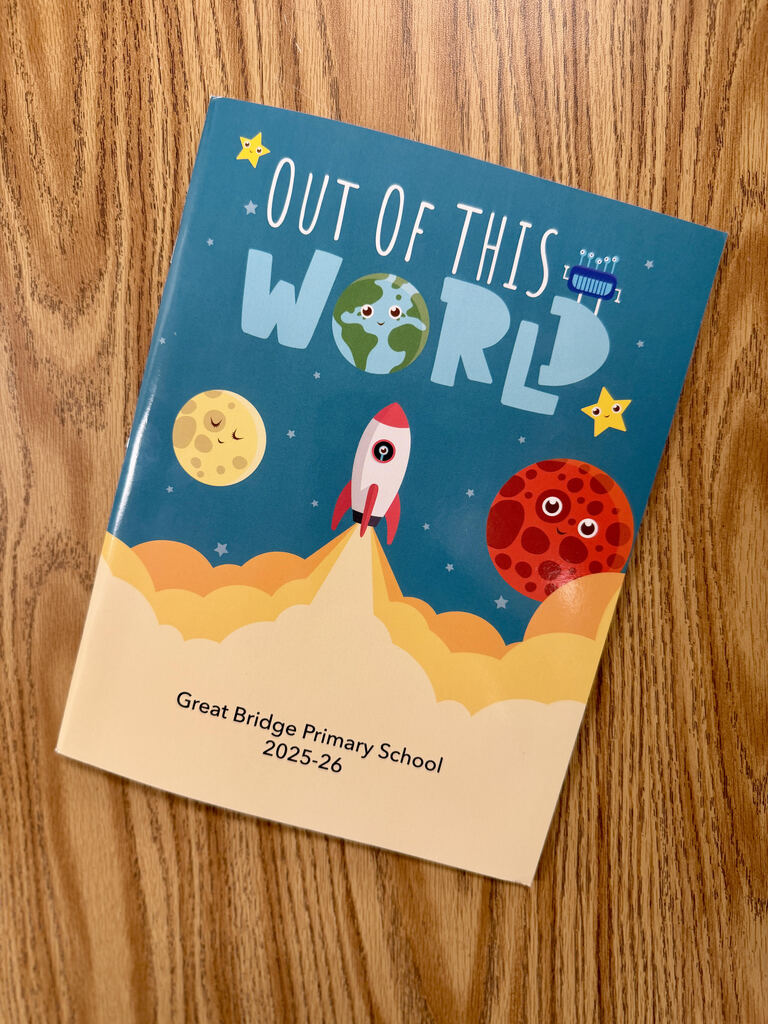 A picture of the 2026 GBP Yearbook with the theme "Out of this World"
