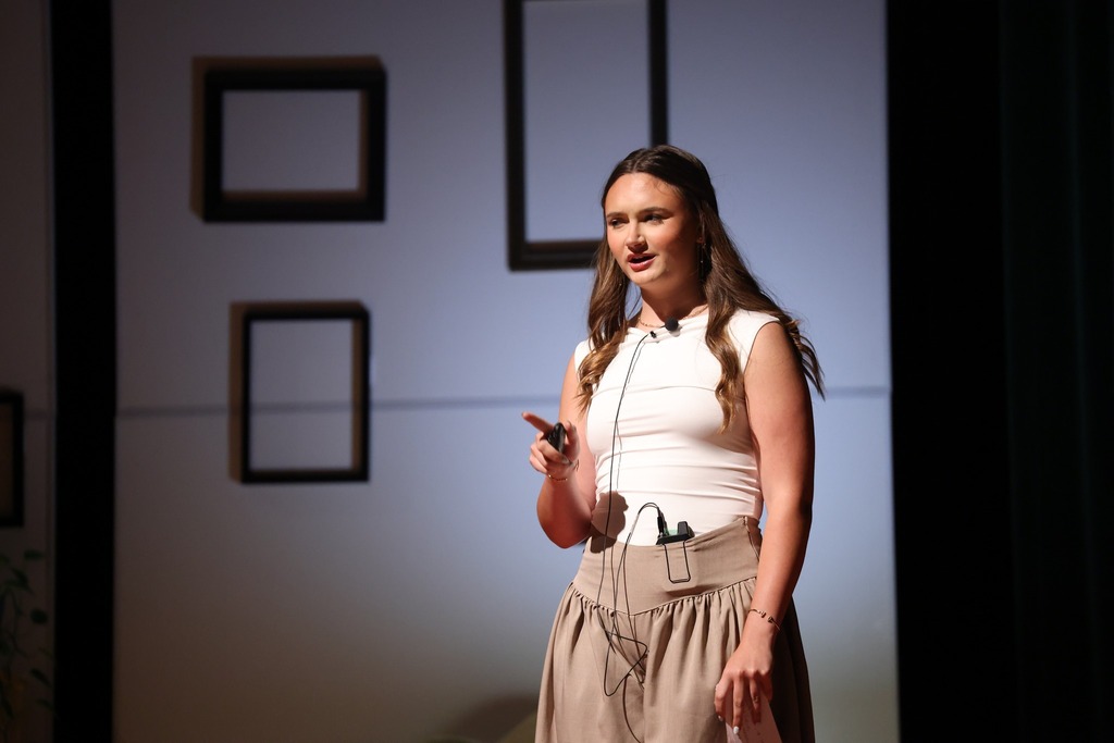 Student giving her TEDx talk.