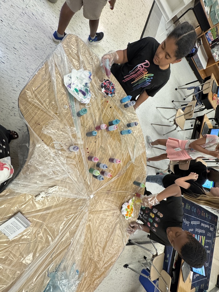 students dying t-shirts in the classroom
