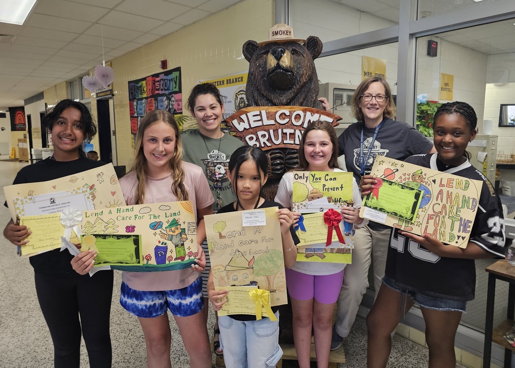 kids in front of bear