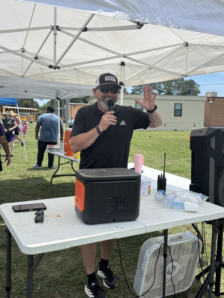 PE teacher talking at field day