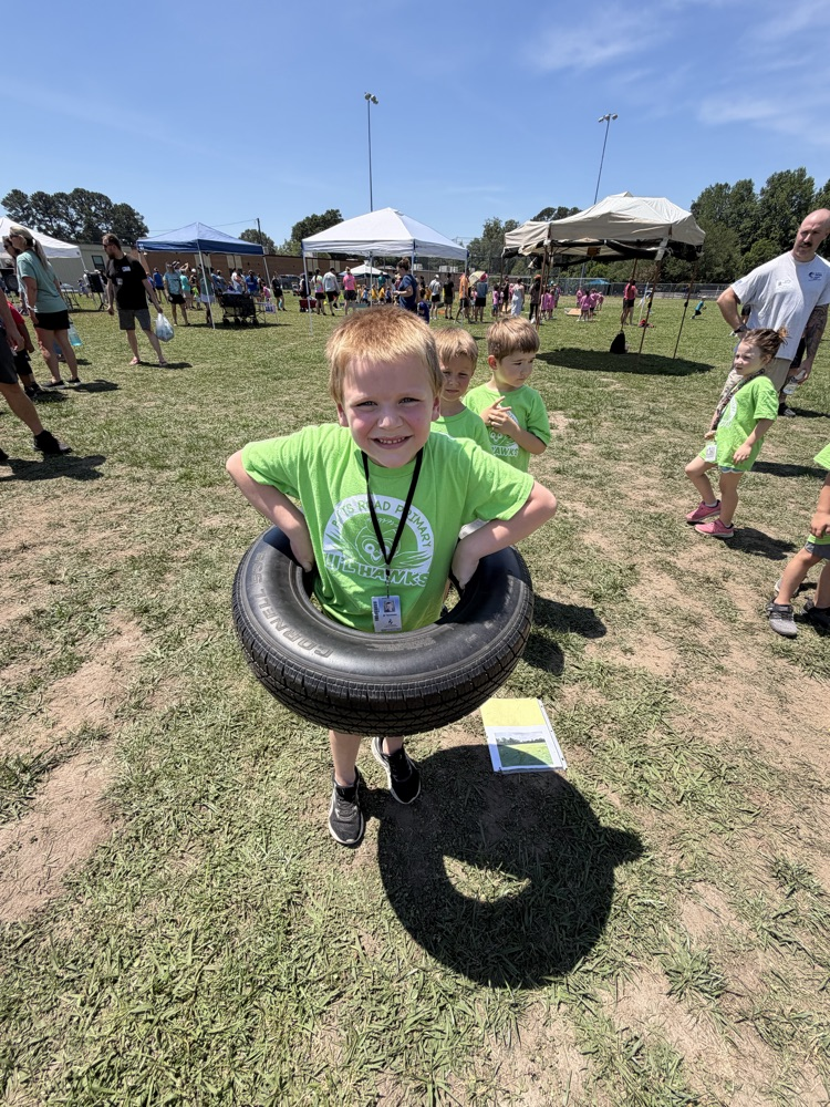 Child with tire around their waist