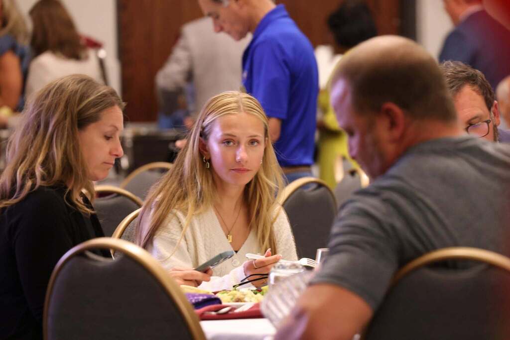 Students and Adults celebrate the Chesapeake Rotary Scholarship