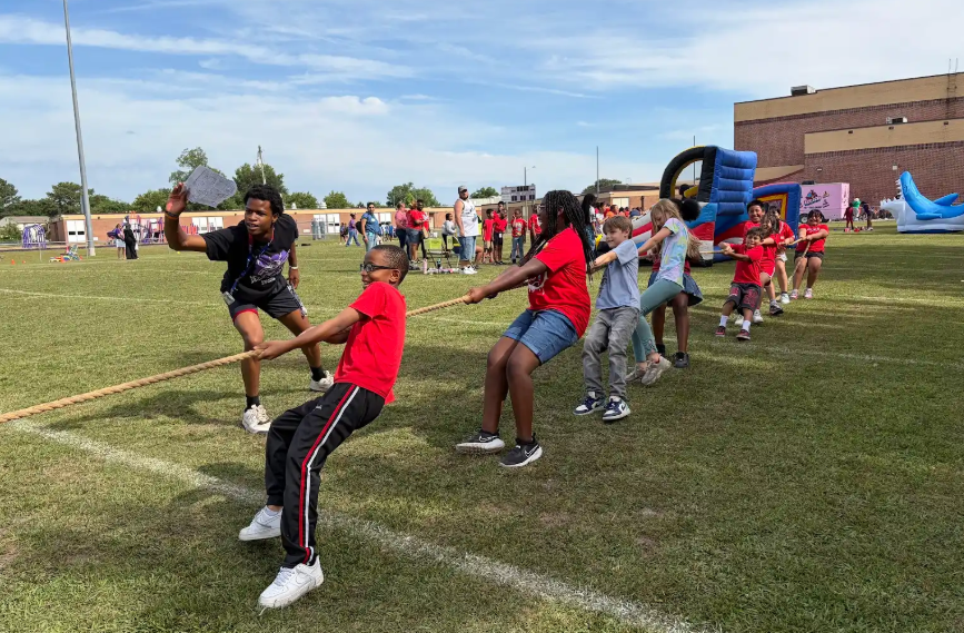 students playing tug of war