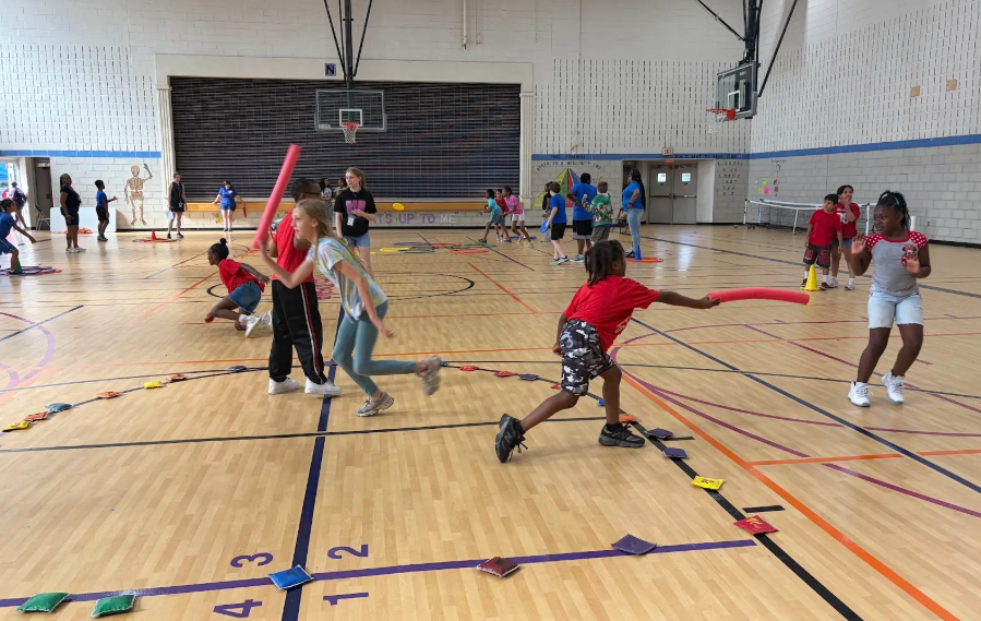 students playing in the gym