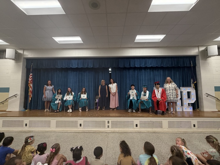 scholarship winners with teachers who put on celebration