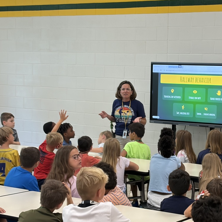 Mrs. Sabato, GBI principal, presenting to our 2nd graders.