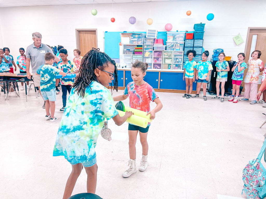 Kids doing indoor field day