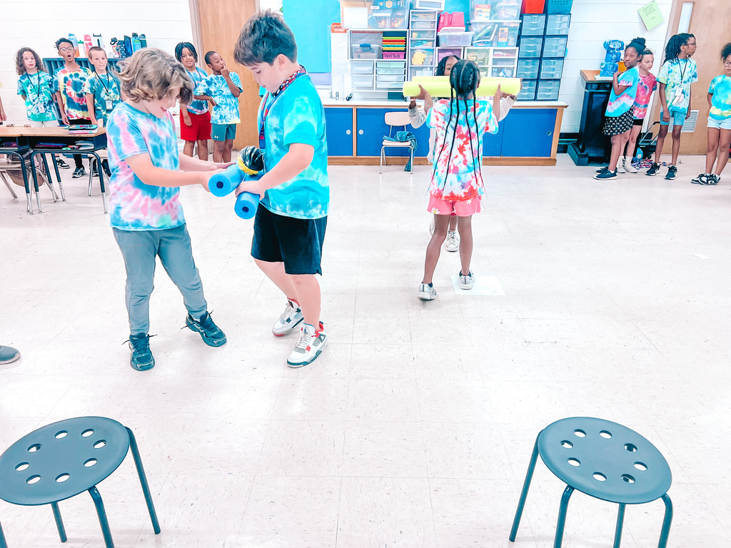 Kids doing indoor field day