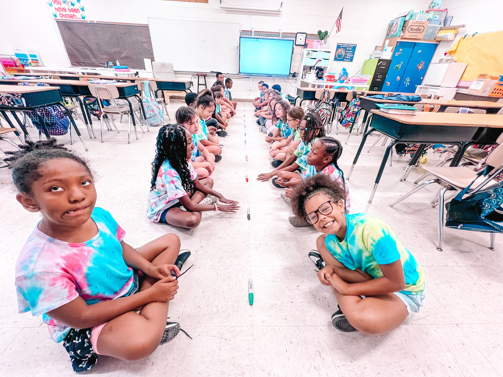 Kids doing indoor field day
