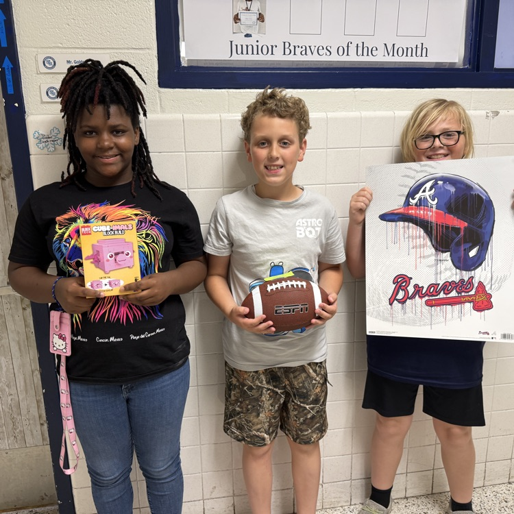 A photo of happy students holding their prizes from the Student Appreciation Week raffle.