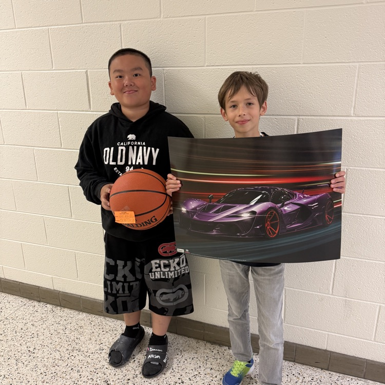 A photo of happy students holding their prizes from the Student Appreciation Week raffle.