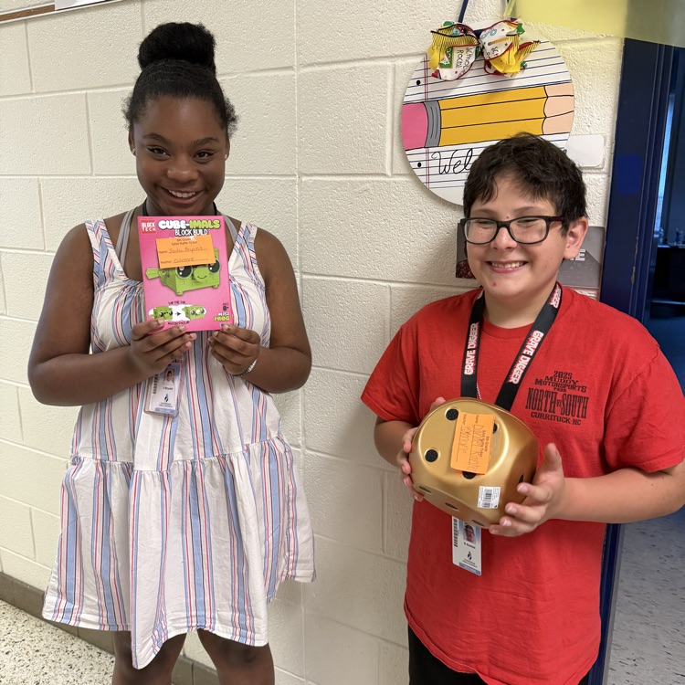 A photo of happy students holding their prizes from the Student Appreciation Week raffle.