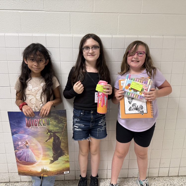 A photo of happy students holding their prizes from the Student Appreciation Week raffle.