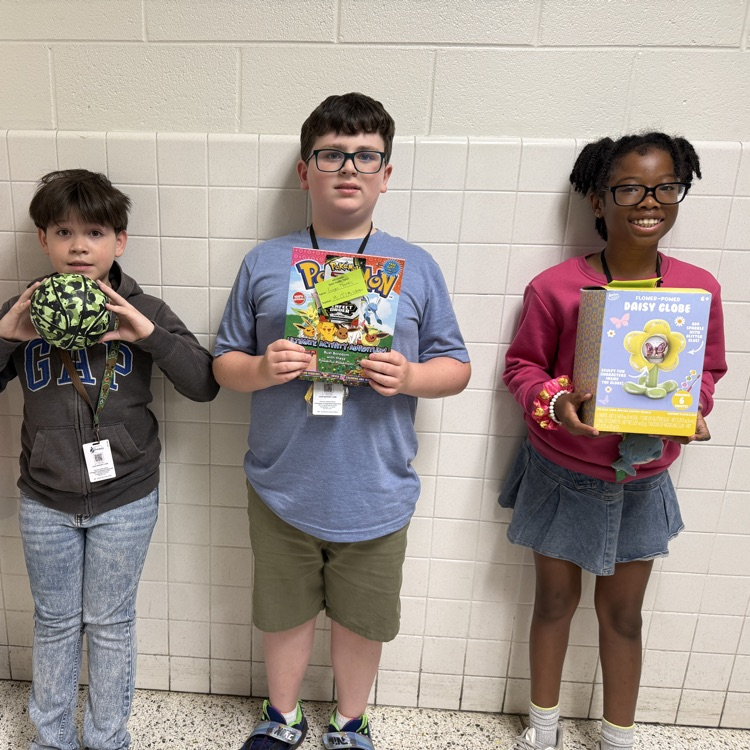 A photo of happy students holding their prizes from the Student Appreciation Week raffle.