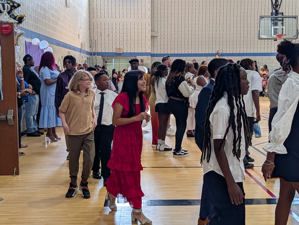 students walking over to the stage