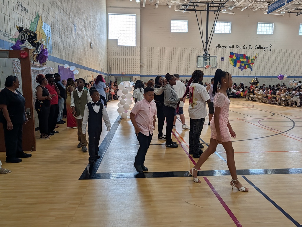 students walking over to the stage