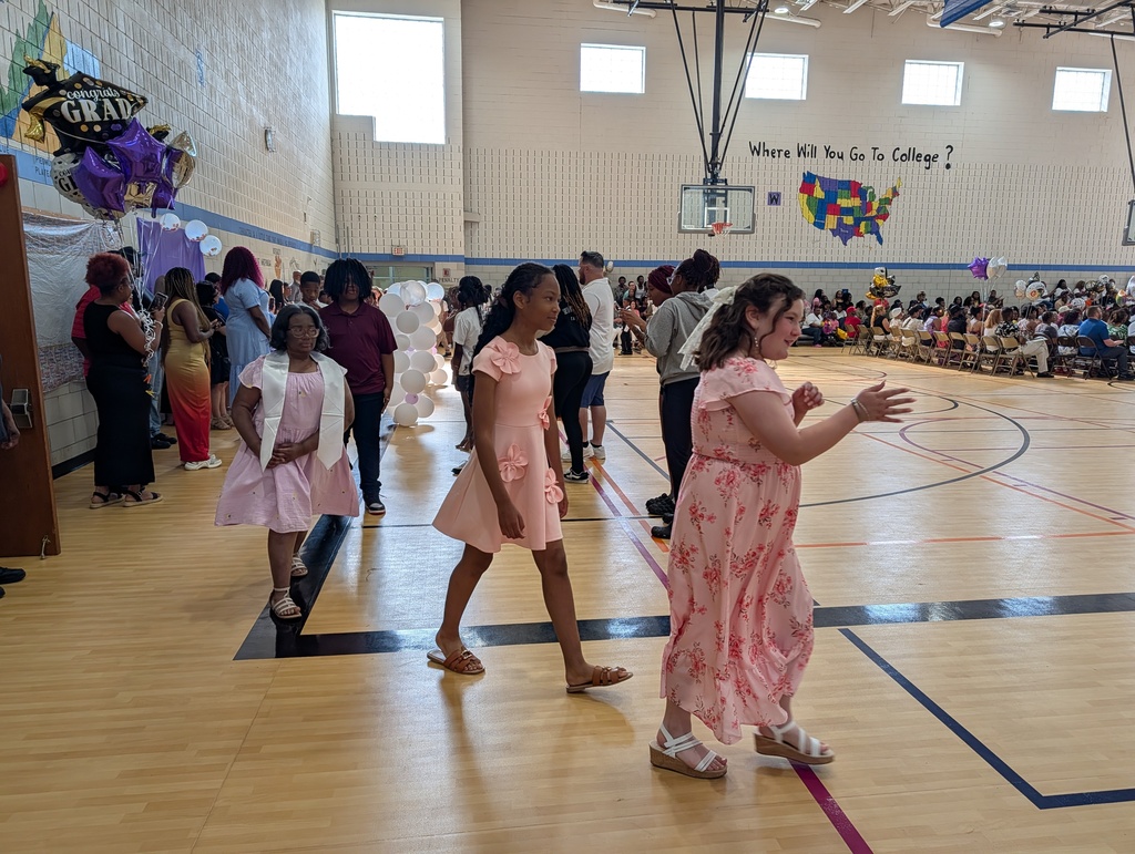 students walking over to the stage