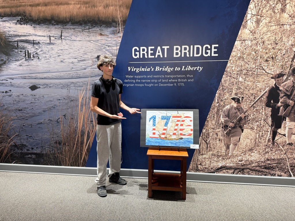 WBHS student posing proudly with artwork for SAIL250