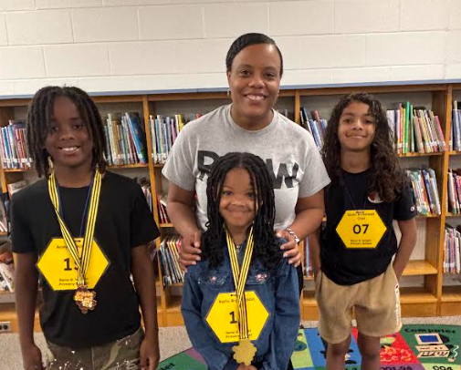 Dr. Dace with Spelling Bee Winners