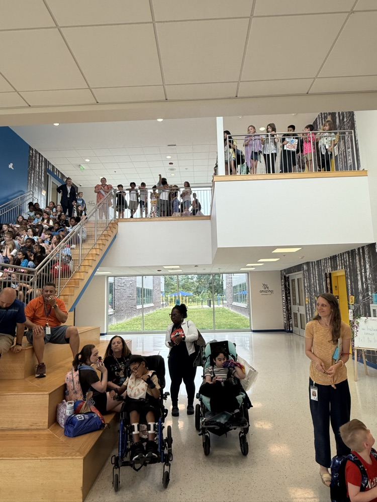 Student sitting on the stairways to say goodbye
