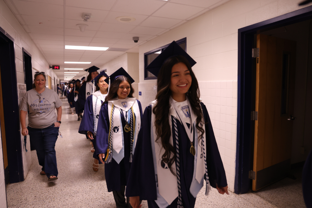 IRHS students walking down the SRI halls.