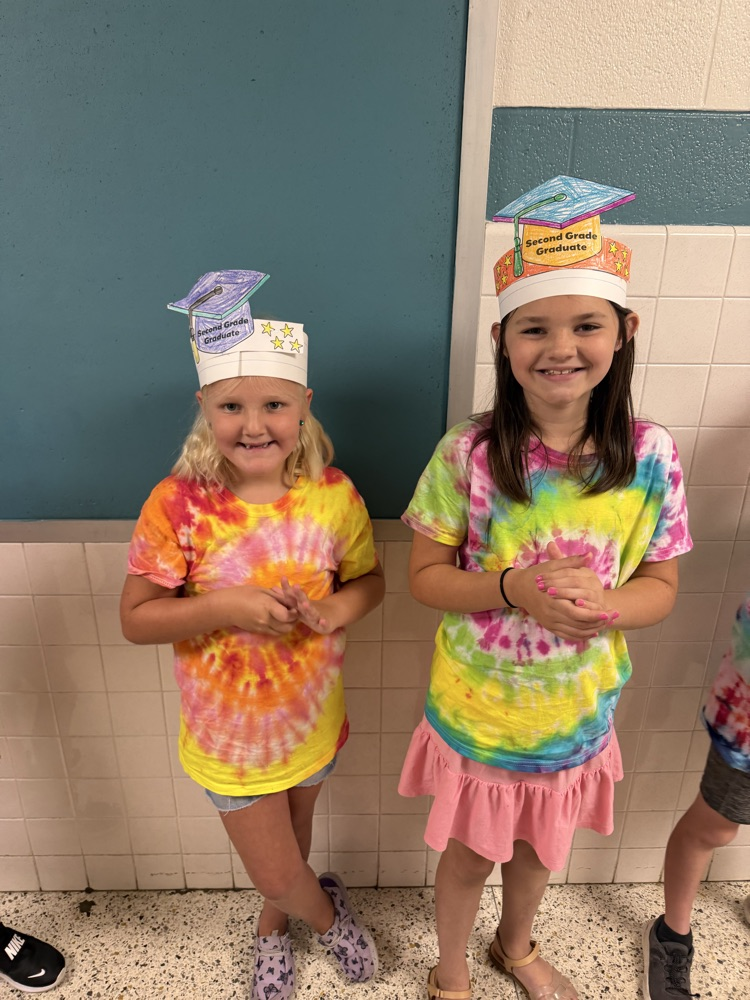 Second graders, getting ready to leave