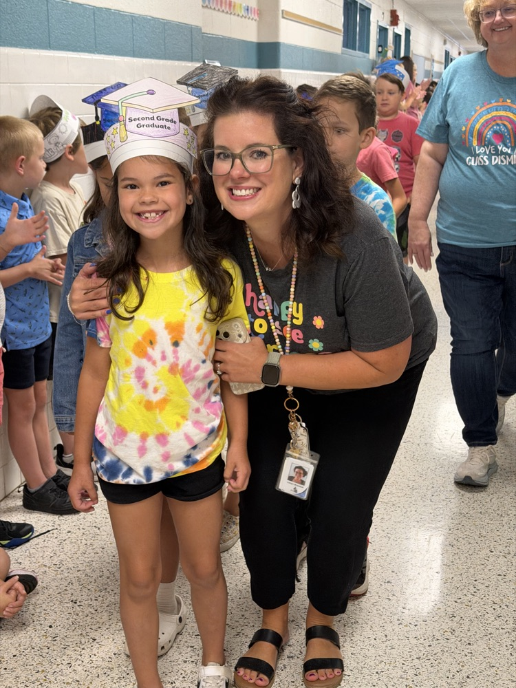 Second graders, getting ready to leave