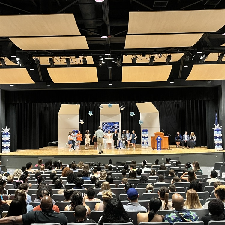 Singing Junior Braves on stage for the RISE to 6th ceremony. 