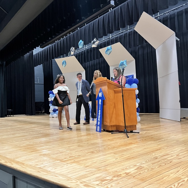 Mrs. Rapier’s student walks across the stage. 